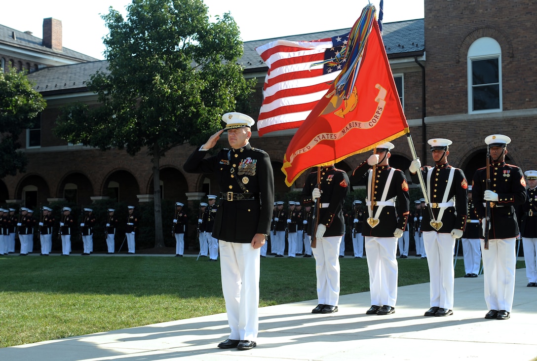 Lt. Gen. Richard F. Natonski salutes as the United States Marine Band plays Ruffles and Flourishes during his retirement ceremony at Marine Barracks Washington Sept. 8. Natonski, who has served in the Marine Corps for 37 years, retires as the most decorated Marine on active duty. (Photo by Lance Cpl. Jeremy Ware)